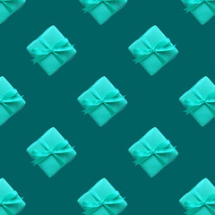 blue gift box with bow-knot pattern on green