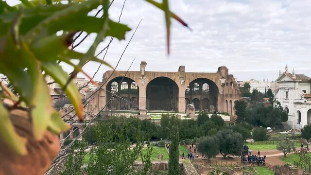 Revealing Shot Of The Basilica Of Maxentius From The Roman Forum Viewpoint In Rome, Italy - sliding reveal shot