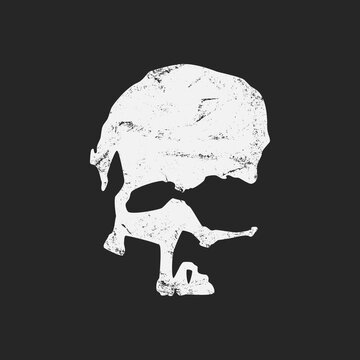 Textured imprint of skull. Black and white grunge vector.