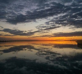 Playa de Cubelles con el mar y reflejos en el agua / Beach of Cubelles with the sea and water reflections 
