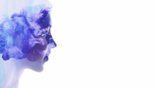 Surreal portrait. Subconscious mind. Blue smoke filling female head silhouette double exposition isolated on white.