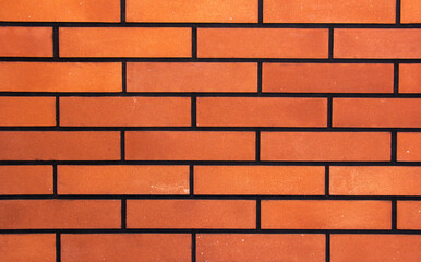 Fototapeta premium Irregular orange brick arrangement. brickwall.