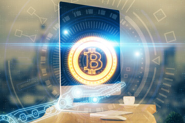 Multi exposure of blockchain theme hologram and table with computer background. Concept of bitcoin...