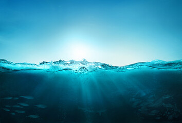 Fototapeta na wymiar ocean blue underwater waves with sun beam clear view realistic, world oceans day banner