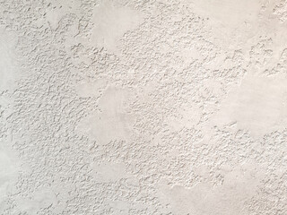 Beige low contrast smooth decorative plaster concrete textured background. Abstract soft neutral...
