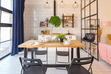 luxury modern design of a cozy small Scandinavian-style studio apartment with white walls, second floor with a library and huge high window full of day light