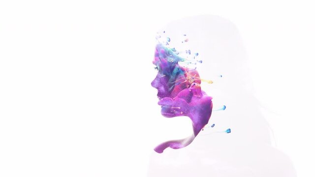 Art portrait. Inner beauty. Purple blue ink swirl in female head silhouette double exposition isolated on white.
