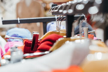 fashion clothing on hangers at the show