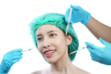 Hands of beautician injecting Botulinum toxin type A to asian woman face.