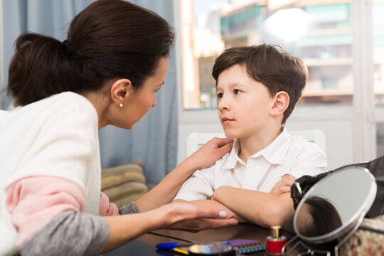 Boy During Serious Talk With Mother