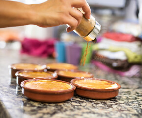 COOKING HOMEMADE CUSTARD AND PUTTING CINNAMON