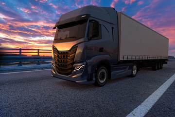 modern truck on the road at sunset