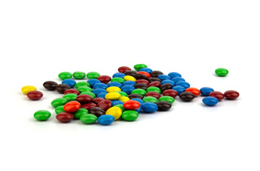 Suratthani Thailand - June 29, 2020: M&M's candies. M&M's produced by Mars, Incorporated. Close up of a pile of colorful chocolate coated candy, chocolate pattern, candies background
