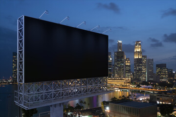 Blank black road billboard with Singapore cityscape background at night time. Street advertising poster, mock up, 3D rendering. Side view. The concept of marketing communication to sell idea.