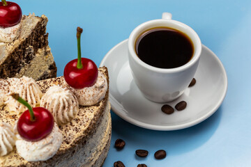 Tiramisu cake, cup of coffee, roasted coffee beans.