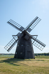 Fototapeta na wymiar Wooden windmill in Sweden
