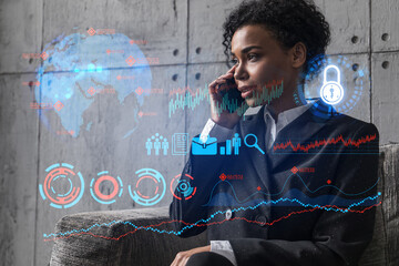 Businesswoman speaks phone andbusiness theme hologram. Double exposure.