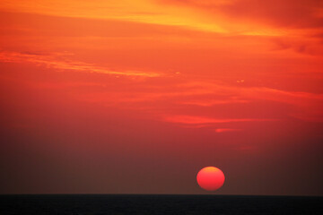 Picturesque red-yellow sunrise over the Black Sea.