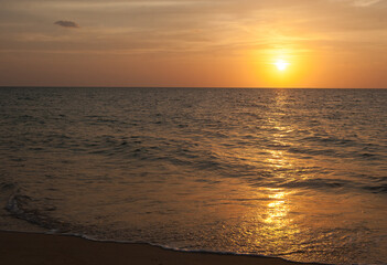 Fototapeta premium Sunset on the Andan Sea in Phuket in Thailand. May kao. Summer. Tourism. Travels.