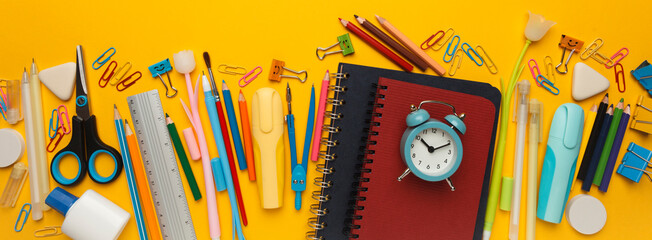 Back to school, items on yellow background. Welcome to learning. Sale accessories for knowledge, retail. Study shopping.