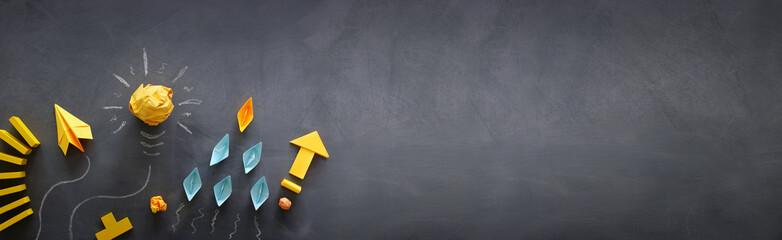 Education concept image. Creative idea and innovation. Crumpled paper as light bulb metaphor over...