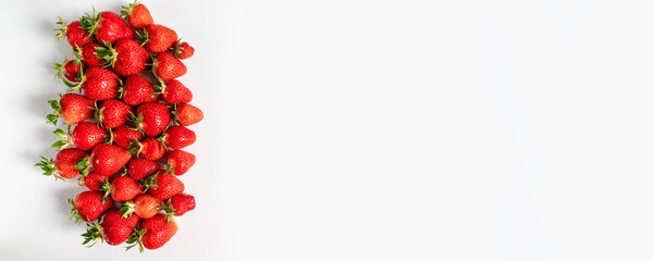 Top view background with organic and tasty strawberry berries frame on a white background