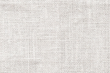 Jute hessian white sackcloth woven burlap texture pattern background in old aged light grey color