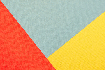Three-color background in bright colors. Pastel colors of gray, yellow and red.