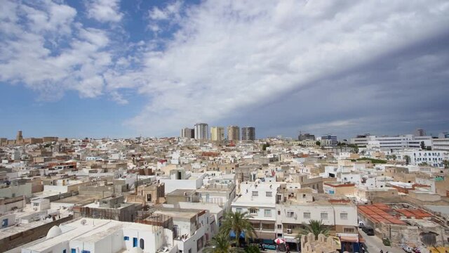 Aerial view video panorama of Tunisian cityscape of  streets of Sousse city in Tunisia country. Medina. Different old and modern architecture, ancient walls of historical buildings. 