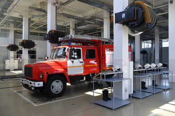 Fototapeta premium truck, fire, emergency, vehicle, red, engine, rescue, firetruck, car, transportation, fireman, transport, isolated, firefighter, safety, fire engine, white, fire truck, ladder, cargo, big, road, depar