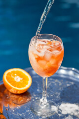 Summer alcoholic refreshing cocktail - Aperol spritz. Popular italian drink