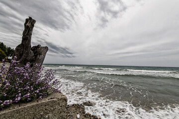 Gushing sea on a stormy summer day, a seen from a beach in Chalkidiki Greece