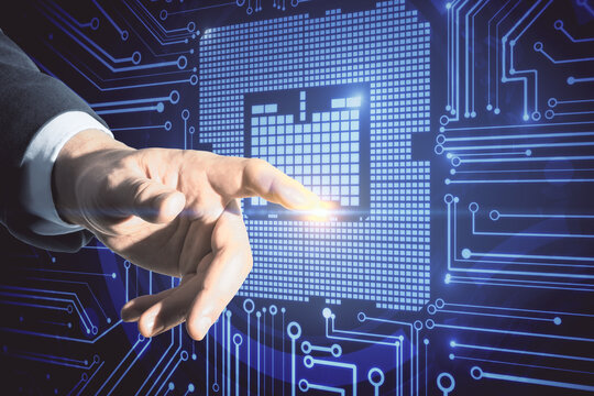 Hand pointing at abstract circuit chip interface.