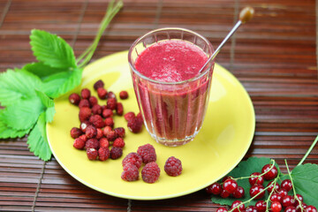 fresh red  fruits smoothie in a glass