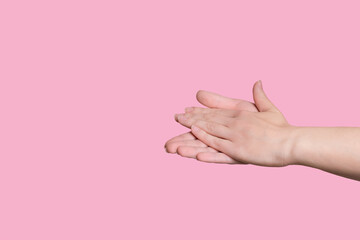Two Caucasian hands clap, applause, without face.
