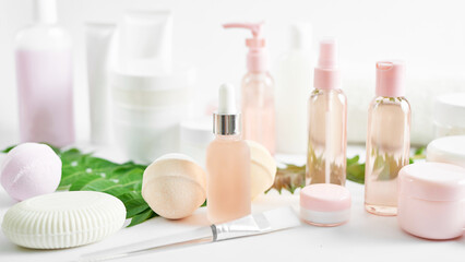 Obraz na płótnie Canvas Flat lay composition Natural cosmetics ingredients for skincare, body and hair care.Top view bottles with facial treatment product white background. Makeup Layout. Set of traditional spa products.