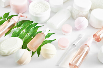 Flat lay composition Natural cosmetics ingredients for skincare, body and hair care.Top view bottles with facial treatment product white background. Makeup Layout. Set of traditional spa products.