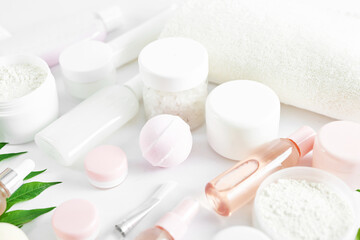 Flat lay composition Natural cosmetics ingredients for skincare, body and hair care.Top view bottles with facial treatment product white background. Makeup Layout. Set of traditional spa products.