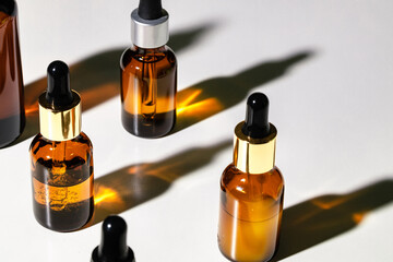 Oily skincare moistrizing brown glass jar with pipette
