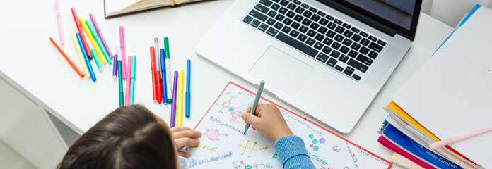 Woman video conferencing with tutor on laptop at home. Distance education concept.