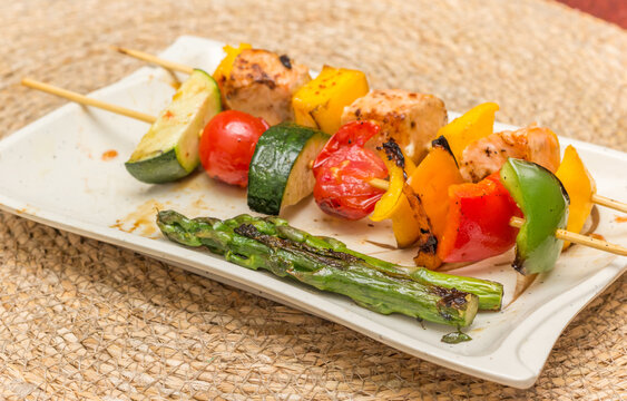 Grilled vegetable and salmon-mango skewer from the barbecue