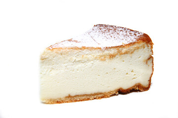 Piece of cheesecake isolated on white