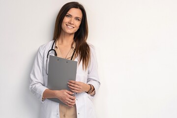 Young, smart and professional doctor isolated on white.