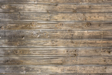 Naklejka premium Ściana z naturalnego brązowego drewna stodoły. Wzór tekstury tła ściany.