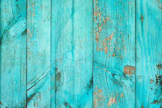 Weathered blue wooden background texture. Shabby wood teal or turquoise green painted. Vintage beach wood backdrop.