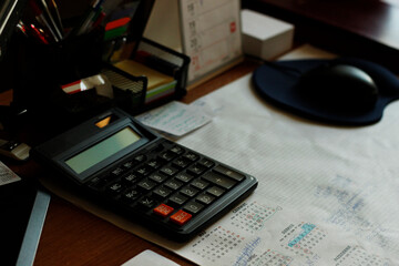 calculator and pen