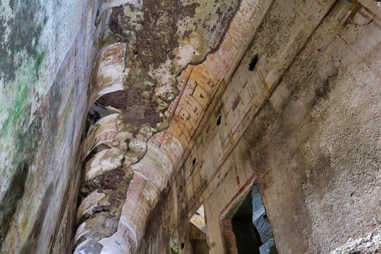 old stone wall of temple, photo as a background in old italian roman domus aurea, rome, italy