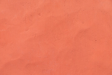 orange red painted  plaster wall
