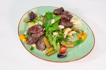 Tasty and juicy roastbeat salad on a white background