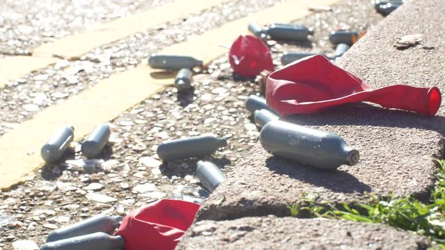 Nitrous Oxide Canisters Litter On Floor Drugs
